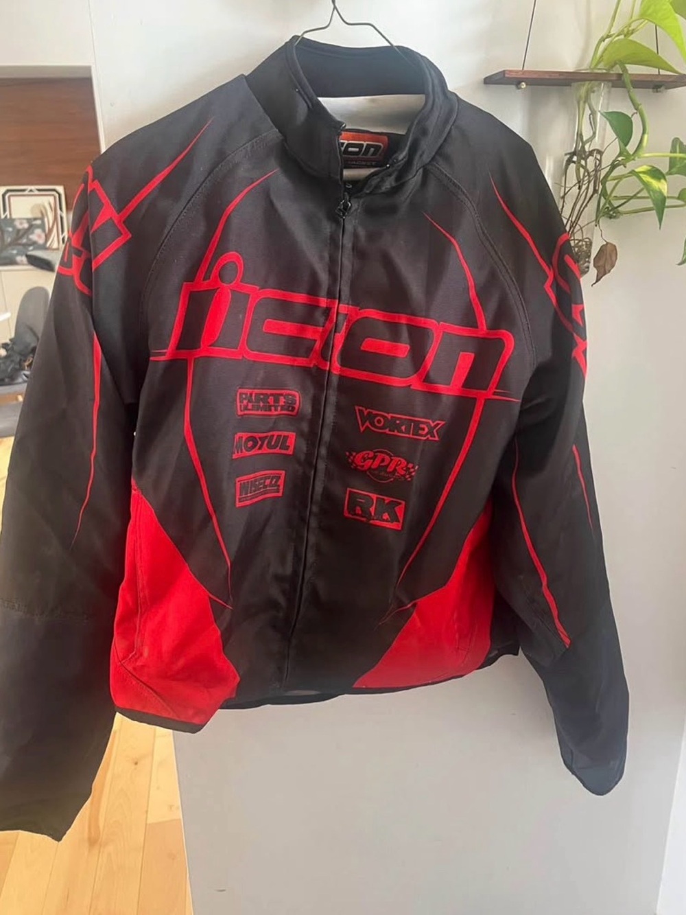 ICON Black and Red Racing Motorcycle Jacket with mesh and inner protection